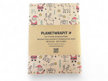 Load image into Gallery viewer, Planetwrapit eco-friendly wrapping paper with Christmas designs on a white background | Hadley Green Home