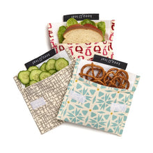 Load image into Gallery viewer, Set of reusable snack bags with different patterns and food items inside on a white background. | Hadley Green Home