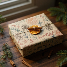 Load image into Gallery viewer, Gift box wrapped in decorative paper with cinnamon sticks on a wooden surface.| Planet Wrap It | Hadley Green Home