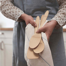 Load image into Gallery viewer, Person holding wooden spoons wrapped in a cloth with a kitchen background | Little Twidlets
