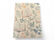 Load image into Gallery viewer, Kraft wrapping paper with floral and book design on a white background | Hadley Green Home