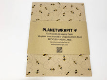 Load image into Gallery viewer, Planetwrapit eco-friendly wrapping paper with bee design on a white background | Hadley Green Home
