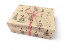 Load image into Gallery viewer, Gift box wrapped in brown paper with black tree pattern and red string bow on a white background | Planet Wrap It | Hadley Green Home