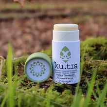 Load image into Gallery viewer, Ku.tis natural deodorant stick on a background of green grass and moss | Hadley Green Home