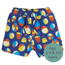 Load image into Gallery viewer, Colorful beach-themed shorts on a blue background with age range label | Hadley Green Home