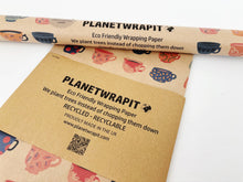 Load image into Gallery viewer, Roll of eco-friendly wrapping paper with 'Planetwrapit' branding on a white background. | Hadley Green Home