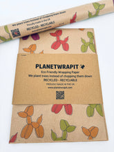Load image into Gallery viewer, Planetwrapit eco-friendly wrapping paper with balloon dog print and recycling information on packaging | Hadley Green Home