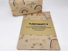 Load image into Gallery viewer, Eco-friendly wrapping paper with rainbow and heart designs on a white background | Hadley Green Home