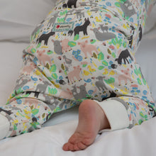 Load image into Gallery viewer, Children's pyjamas with animal pattern on a white surface | Hadley Green Home