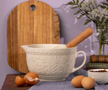 Load image into Gallery viewer, Mason cash in the meadow floral  textured Batter Bowl on a table with eggs and a cutting board. | Hadley Green Home 
