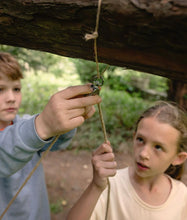 Load image into Gallery viewer, Two children outdoors, one holding a rope and the other looking on, with a natural background. | The Den Kit Co | Hadley Green Home
