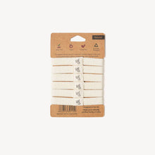 Load image into Gallery viewer, Set of natural hair ties on a cardboard packaging with a white background | Hadley Green Home
