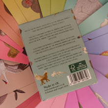 Load image into Gallery viewer, Back of a card with text and a barcode, surrounded by colourful cards with animal illustrations. |Button and Squirt | Hadley Green Home
