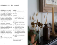 Load image into Gallery viewer, Reed diffuser setup with a brown bottle and wooden stand on a shelf.  | Hadley Green Home
