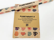 Load image into Gallery viewer, Roll of Planetwrapit eco-friendly wrapping paper with coffee cup design on a white background | Hadley Green Home
