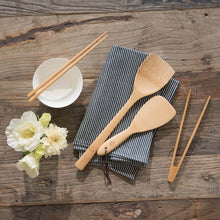 Load image into Gallery viewer, Wooden utensils including spatulas and chopsticks on a wooden surface with a floral arrangement. | Little Twidlets
