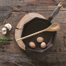 Load image into Gallery viewer, Cast iron skillet with wooden spoon and eggs on a rustic wooden surface | Little Twidlets

