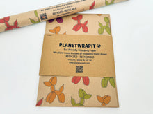 Load image into Gallery viewer, Planetwrapit eco-friendly wrapping paper with dog ballon designs on a white background | Hadley Green Home
