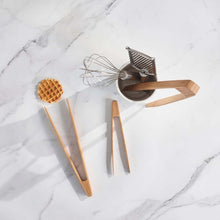 Load image into Gallery viewer, Set of kitchen utensils including a whisk, spatula, and ladle on a marble surface
