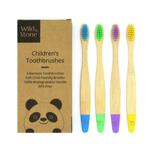 Load image into Gallery viewer, A pack of four multicolored children's bamboo toothbrushes with soft bristles, presented in recyclable cardboard packaging with a panda logo on. | Wild and Stone |Hadley Green Home
